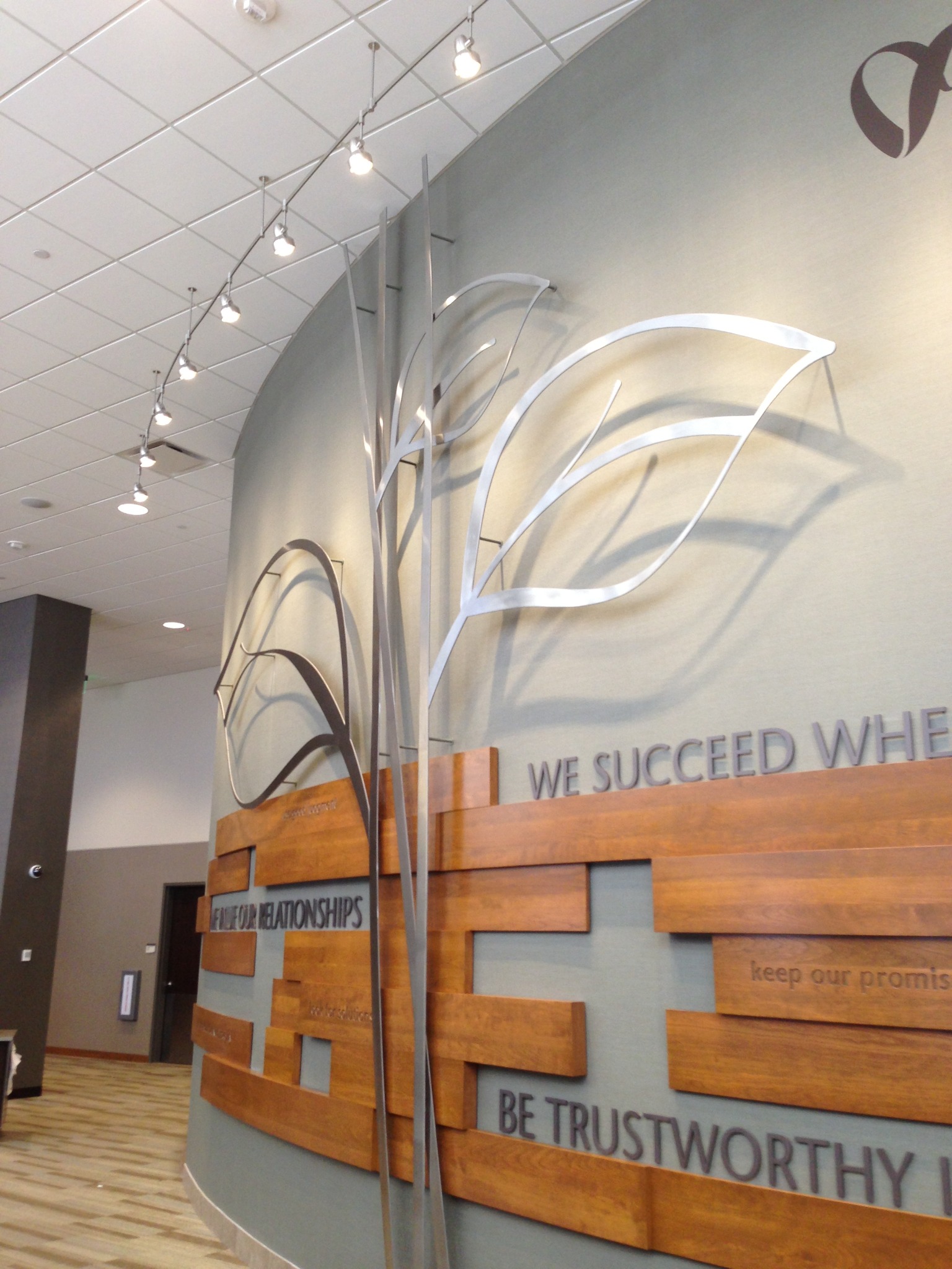 Custom metal and wood architectural feature wall